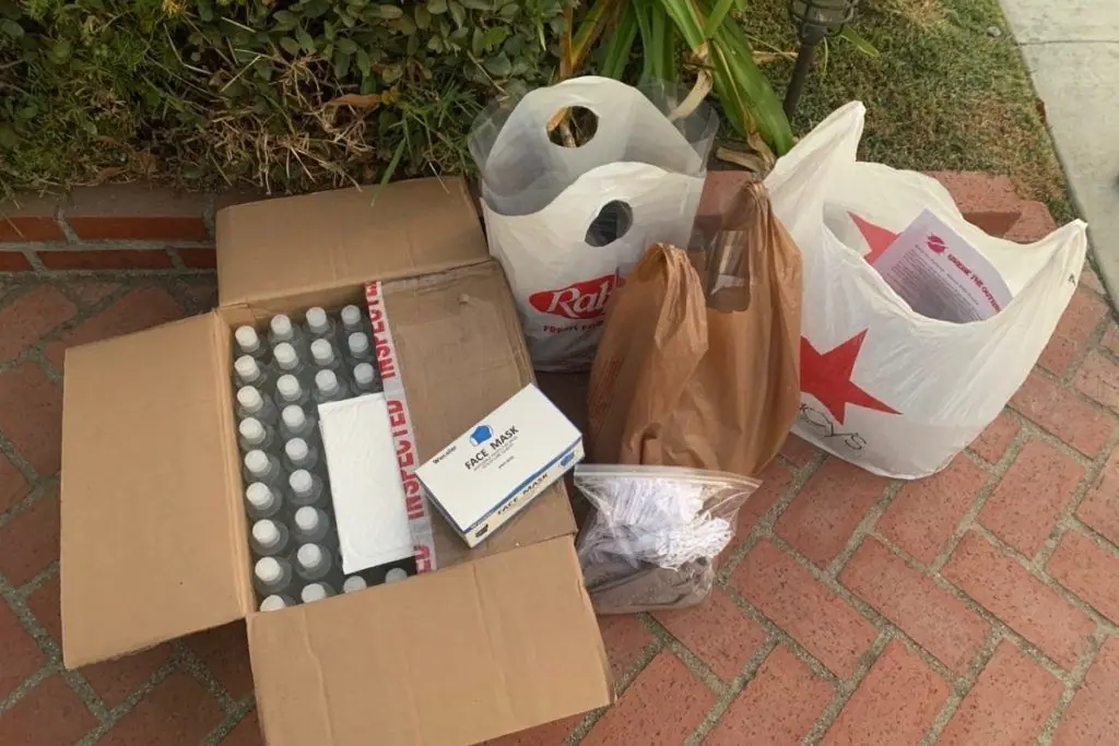 Break the Outbreak volunteers with donated supplies